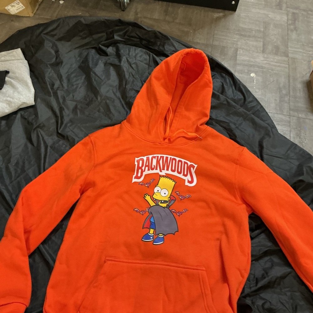 Orange Hoodie with Cartoon Graphic